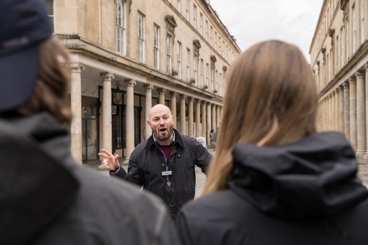 a person standing in front of a building