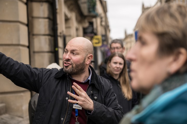 a man holding a wine glass