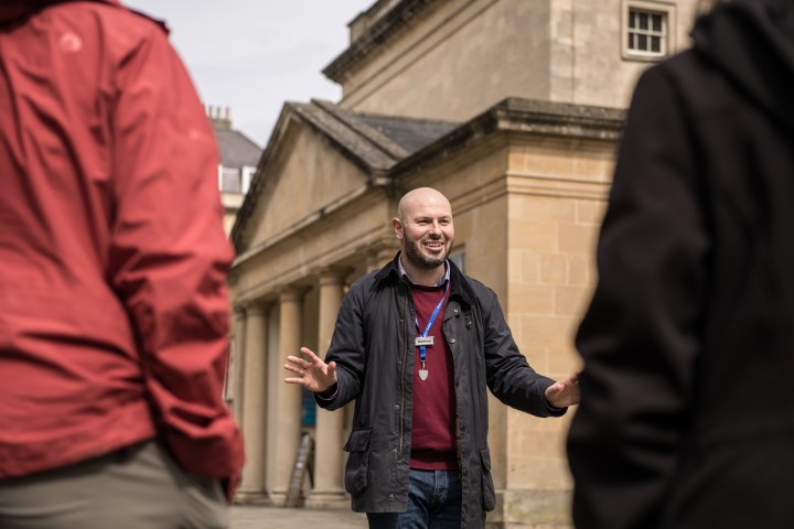 a person standing in front of a building