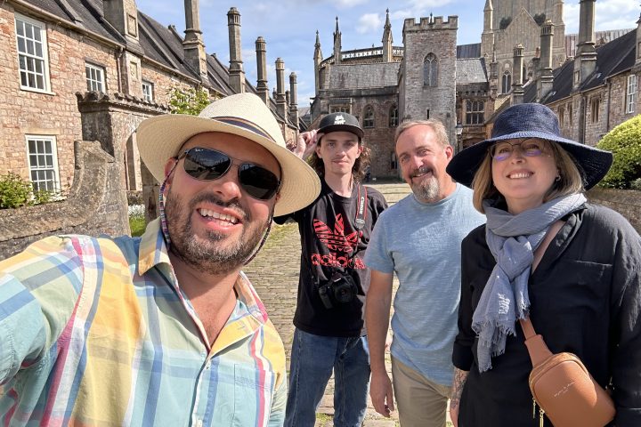 a group of people standing in front of a building