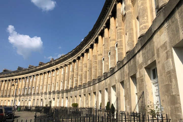 a large building with Royal Crescent in the background