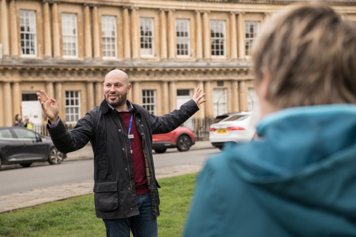 a person standing in front of a building