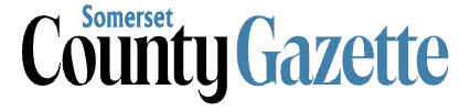 Logo with text 'Somerset County Gazette' in blue and black.